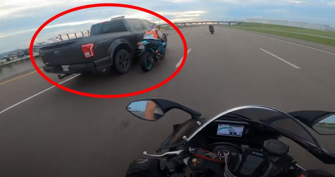 Erratic Truck Driver Clips Rider on Highway
